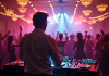 DJ de mariage derrière un booth moderne lors d'une réception festive